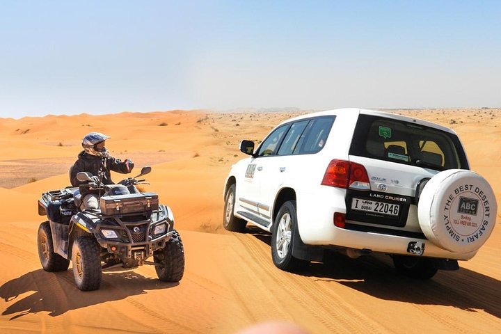 Experience the vast desert expanse of Dubai on an exhilarating self-ride ATV adventure. Explore the stunning scenery while enjoying camel rides and a memorable Arabian buffet dinner under the stars.